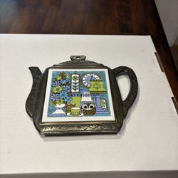 decorative ceramic teapot-shaped trivet or hot plate