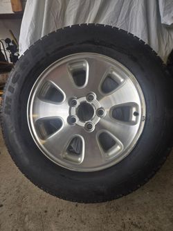 One tire and rim jeep