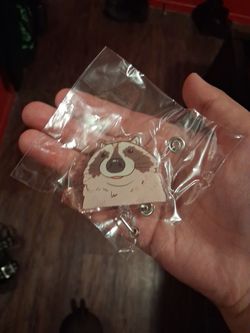 Badge reel clips