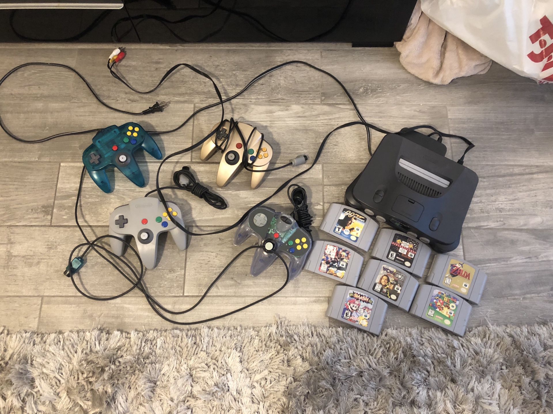 Nintendo 64 with lots of games and controllers Super Mario 64 Zelda etc.