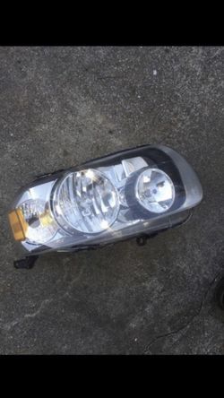 02-06 ford escape passenger headlight