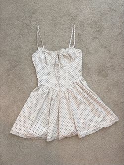 coquette style white polka dot corset mini dress