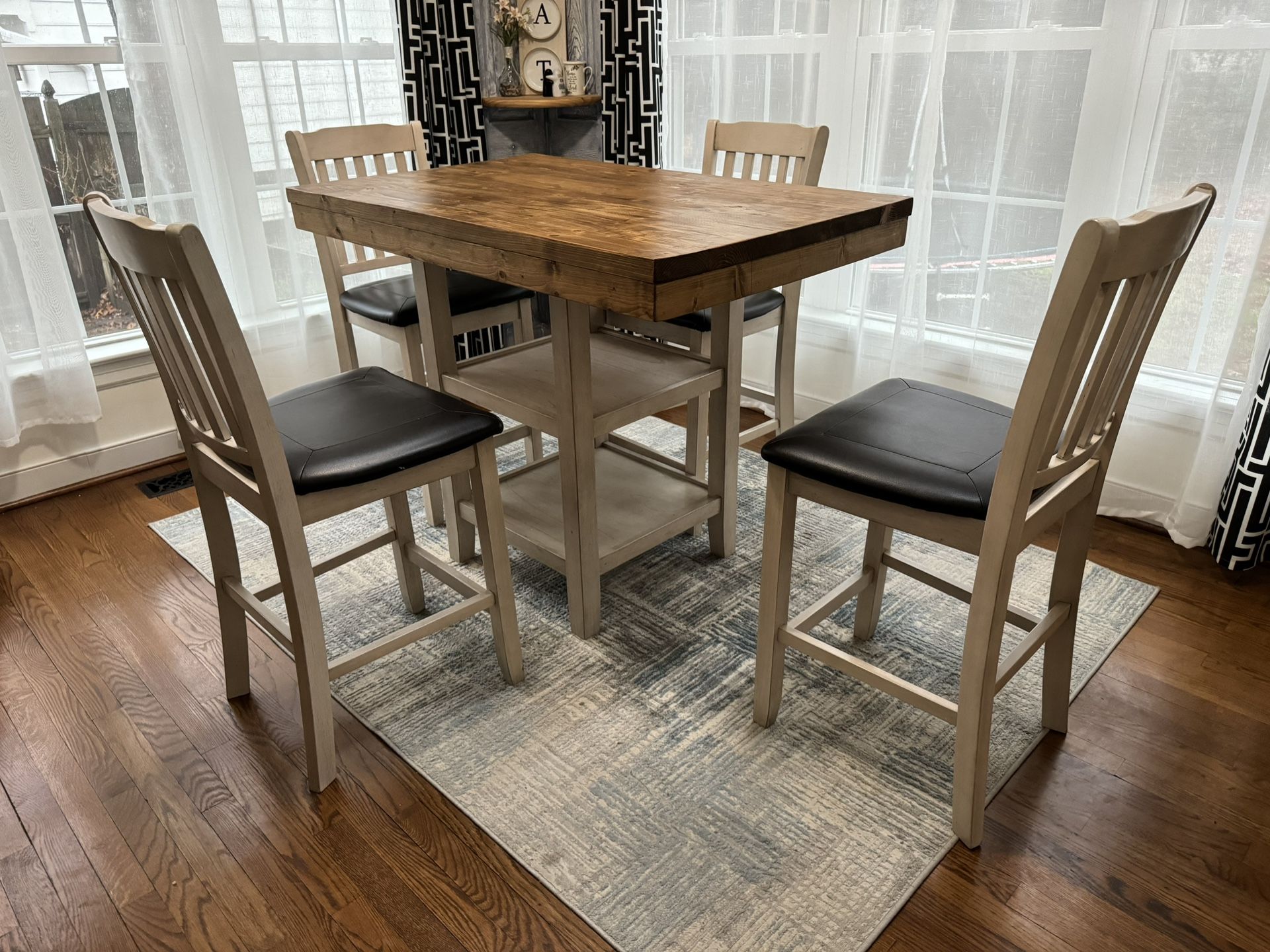 Wooden counter height table with 4 chairs