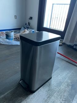 Small all metal foot pedal trash bin
