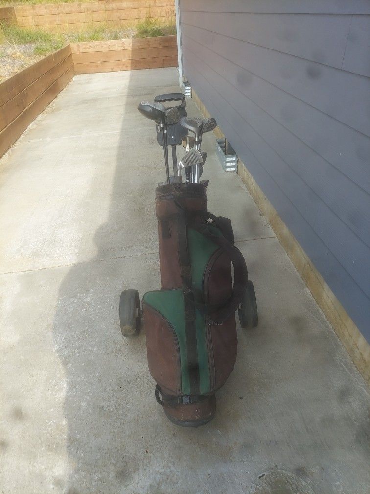 Golf Clubs & Cart.