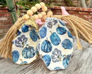 Handmade oyster shell ornaments ā blue and white harvest pumpkins/fall decor/Thanksgiving/coastal farmhouse
