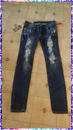 Women's size 11 WET SEAL distressed spiked jeans