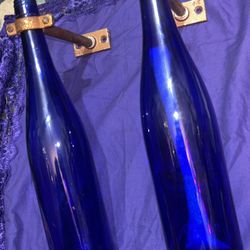 Wine bottle sconces
