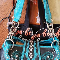 Turquoise and black purse with bling...