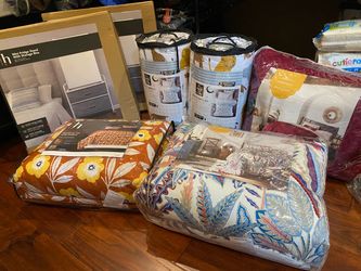 Brand new twin/full bedding sets and 2 nightstands-$10 each. Price is firm.