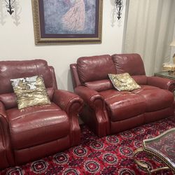Red leather reclining sofa