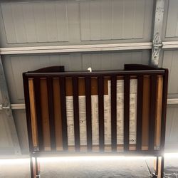 Beautiful Compact/ Collapsible Wooden Crib 