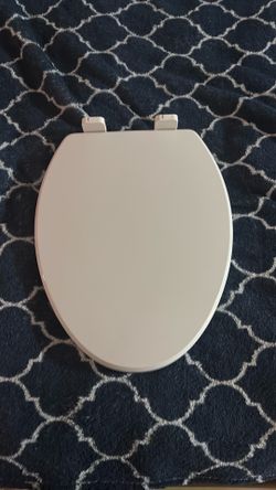 Restroom toilet lid
