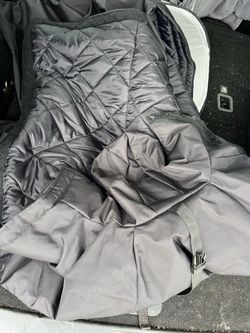 New black cargo liner, sleeping bag and winter coat all in one