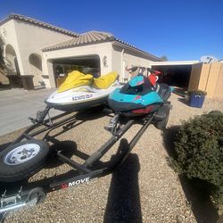 2005 and 2017 Seadoos And Trailer