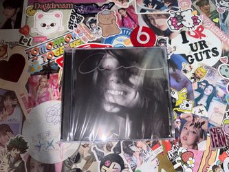 Ariana Grande - Petal (signed) CD