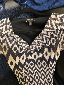 Ladies size medium sexy BEBE dress. Luxury and slightly worn