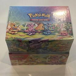Prismatic Evolution Tins Display (SEALED) 