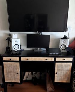 Dark wood / rattan desk with plenty of storage