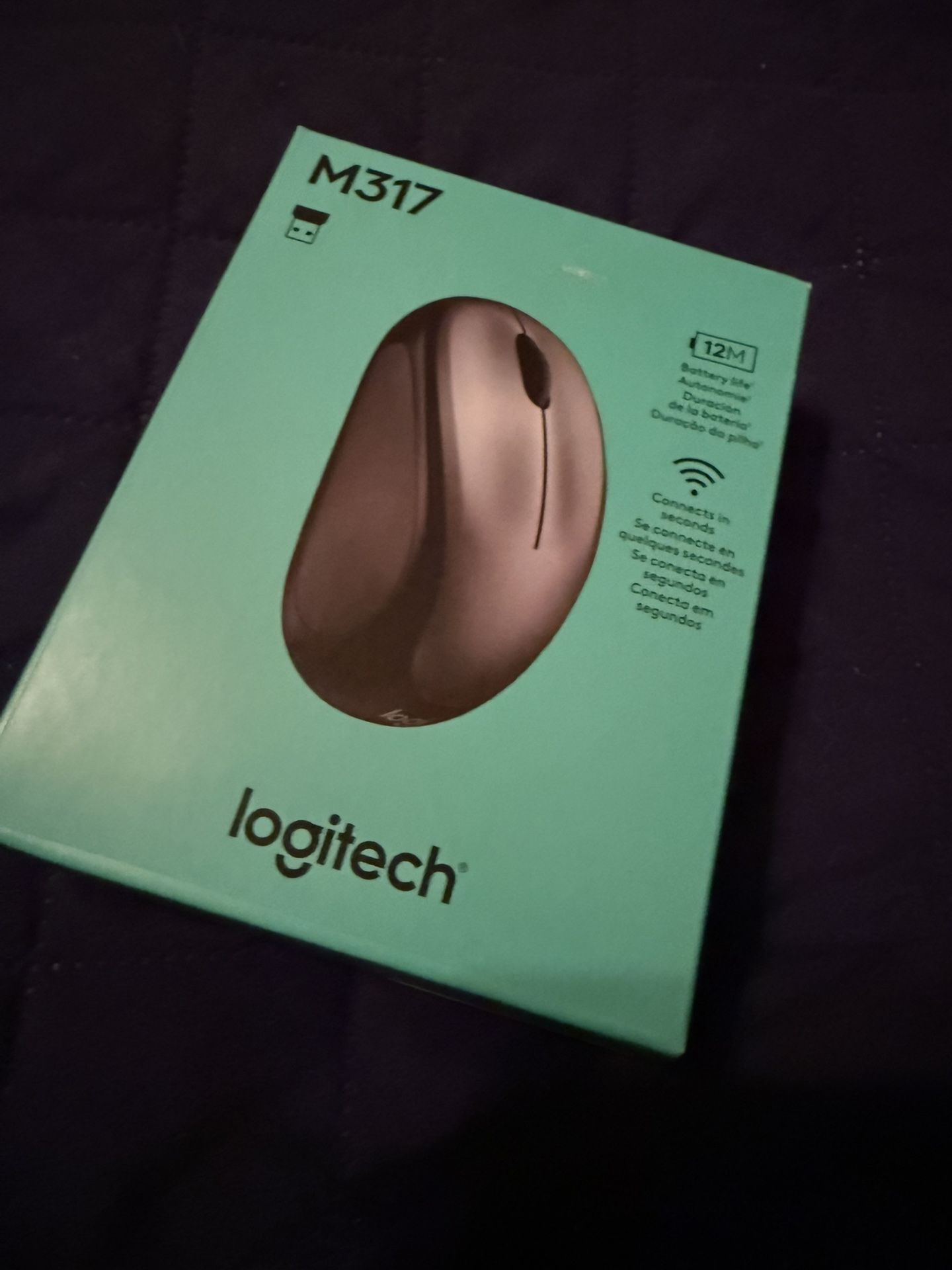 Logitech M317 wireless mouse. New in box