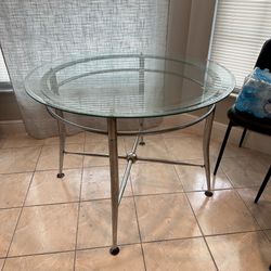 Round Glass Top Silver Base Dining Table