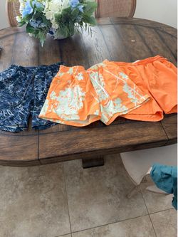 3 Medium Men’s Lululemon bathing shorts