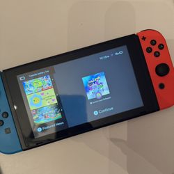Nintendo Switch Console w/ Blue & Red Joy-Cons