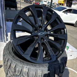 SET OF FOUR 24” CHEVY GMC WHEELS AND TIRES