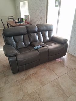 Three piece leather living room set