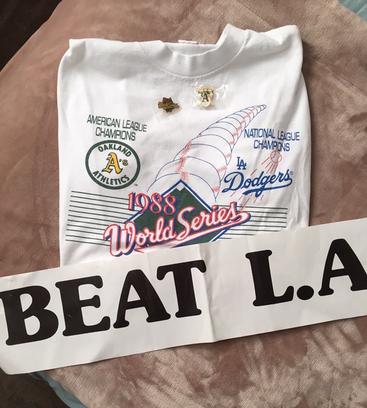 1988 WORLD SERIES TEE SHIRT OLUS PIN AND BEAT L. A. SIGN WE USED AT THE  GAME PLUS PROGRAM WITH AUTOGRAPHS for Sale in Pleasanton, CA - OfferUp