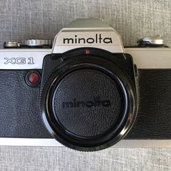 Minolta XG-1 35mm Film SLR/ Very Clean Working Needs Batteries 