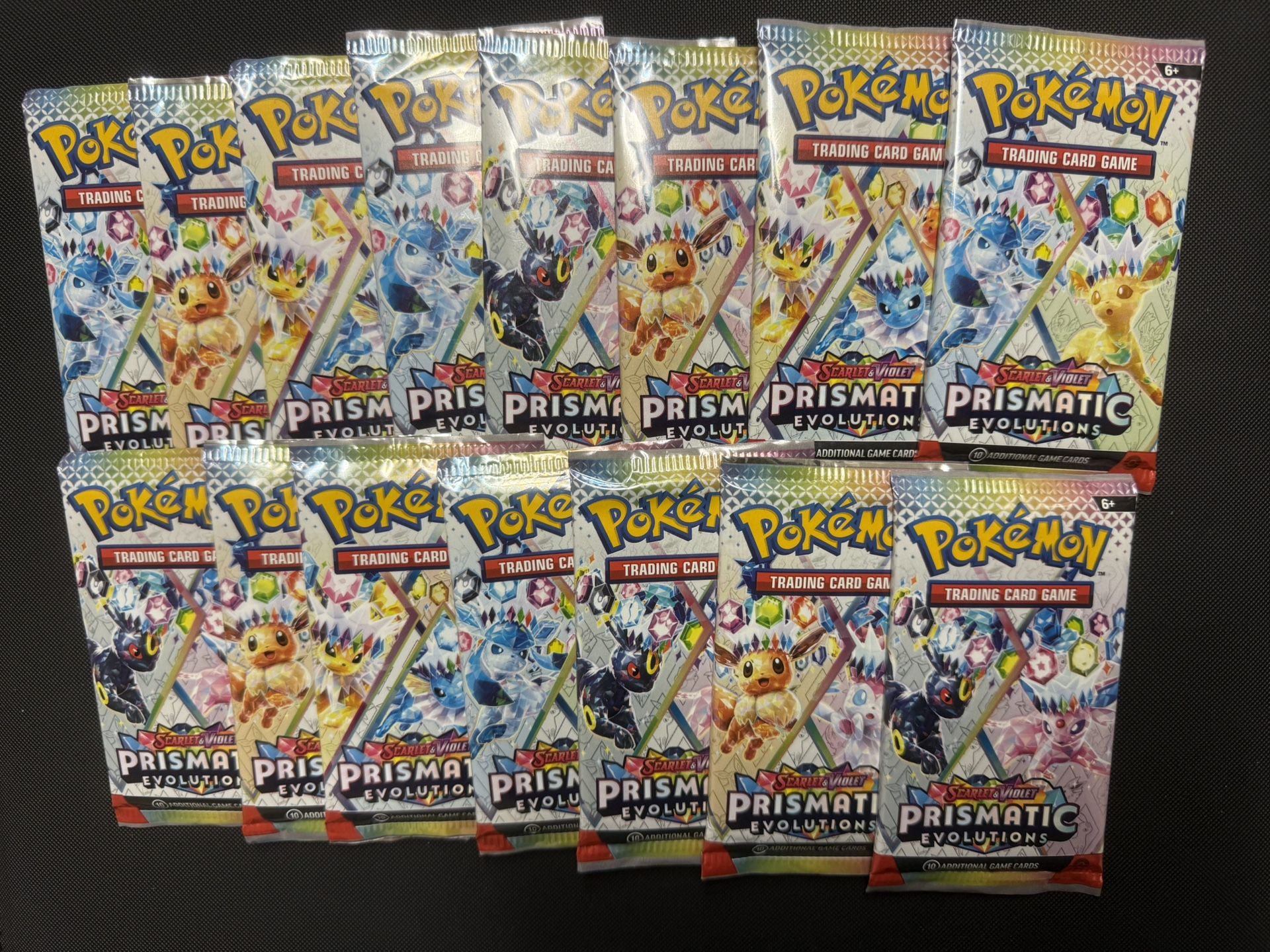 15 Pokemon Prismatic Evolutions Booster Packs