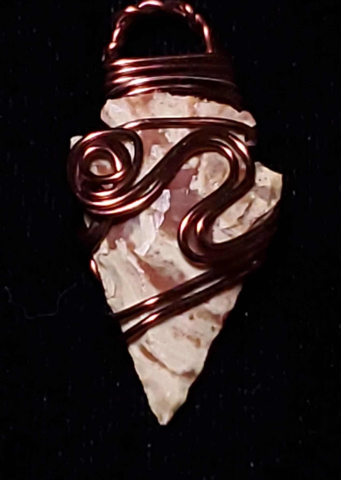 Wire wrapped brown & white jasper arrowhead.