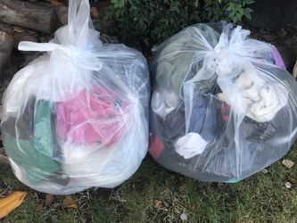 Two bags full of sweaters for boy and girl take both for $25