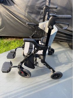Vovic foldable wheelchair / walker