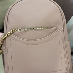 dusty pink/purple mini backpack with tag