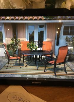 Five piece set includes table and four chairs