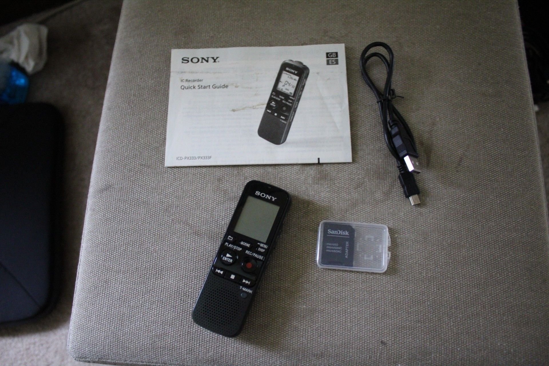 Very nice Sony voice recorder with syncing cord, instructions and 4gb card