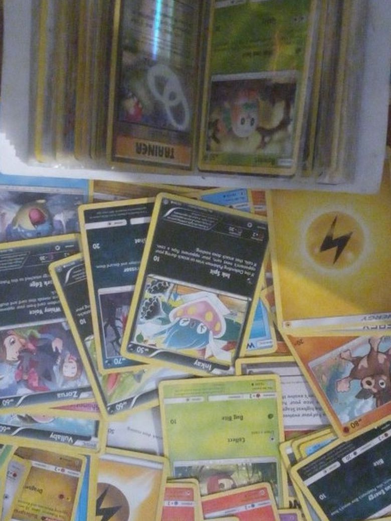 Over 120 Pokemon Cards Several Holos And Rare Cards