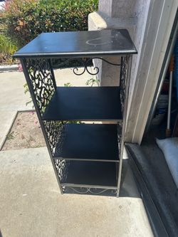 Black metal shelf
