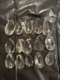 Group of large almond glass prisms