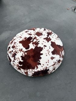 round, plush dog bed