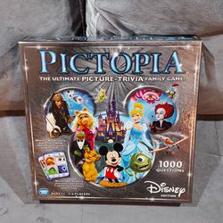 DISNEY PICTOPIA THE ULTIMATE PICTURE-TRIVA FAMILY GAME! AGES 7+ (2-6 PLAYERS) MAKE FAMILY TIME MAGICAL.