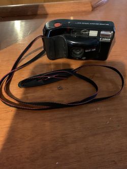 CANON SURE SHOT SUPREME  VINTAGE 35 mmFILM CAMERA  38. mm1-2.8 LENS .QUARTZ DATE