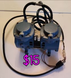 Small Thomas compressor, on the other side it looks like it also may be a vacuum  
$15