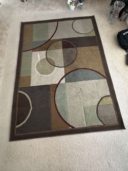 Area Rug 90.5” X 62.5”