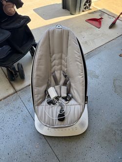 Multiple motion baby rocker/swing