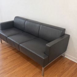 2 Beautiful 3 person leather couches originally 2 grand