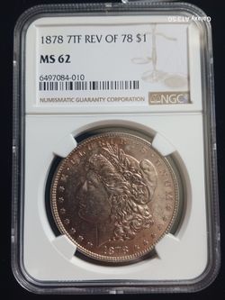 an 1878 Morgan silver dollar MS 62