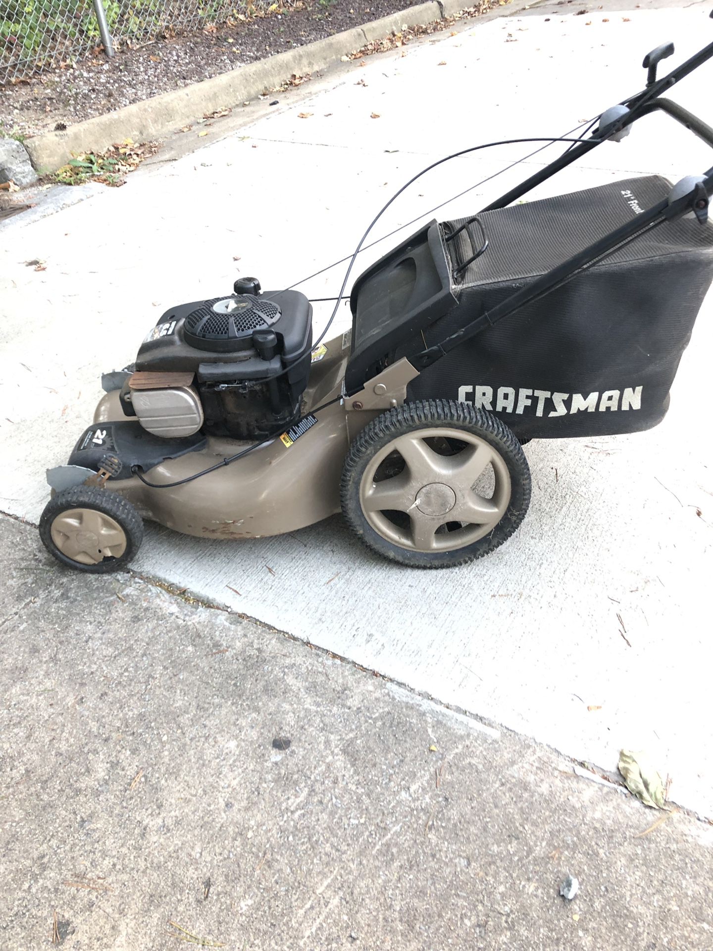 Craftsman self propelled mower with bag.